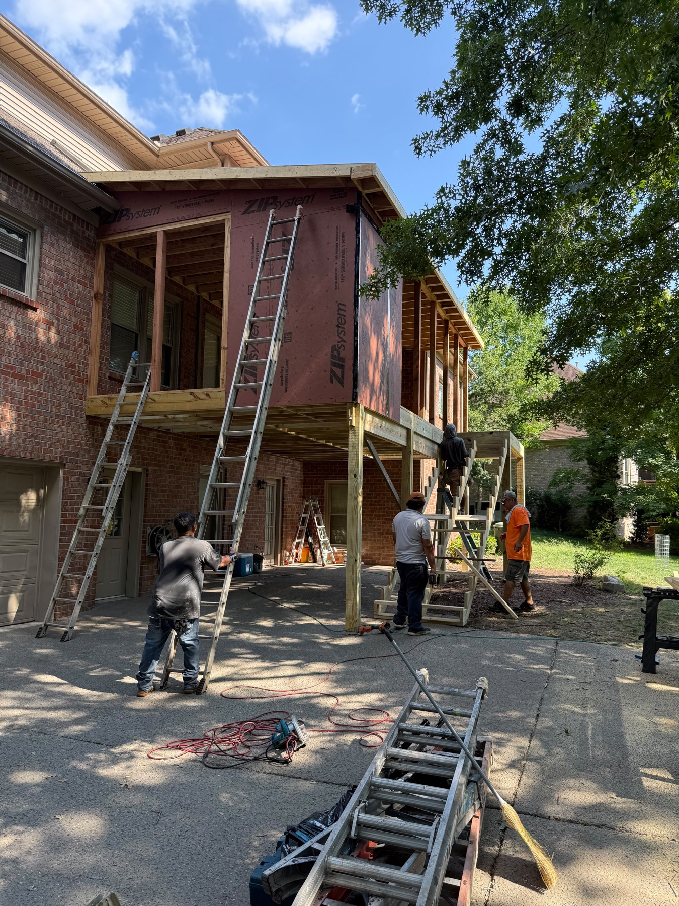 Construction crew building an addition